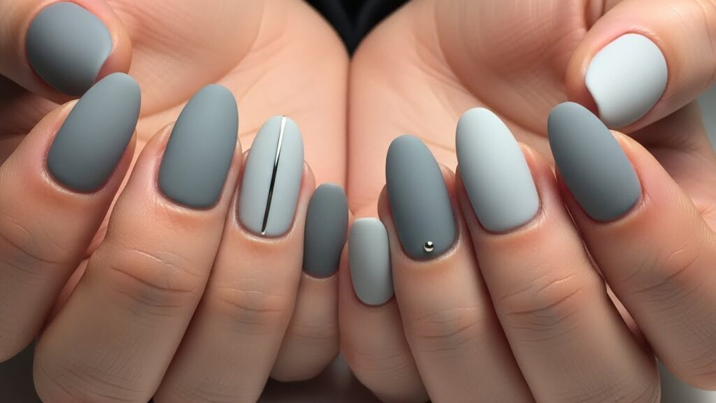 Soft grey minimal winter nails with matte finish and modern aesthetic.