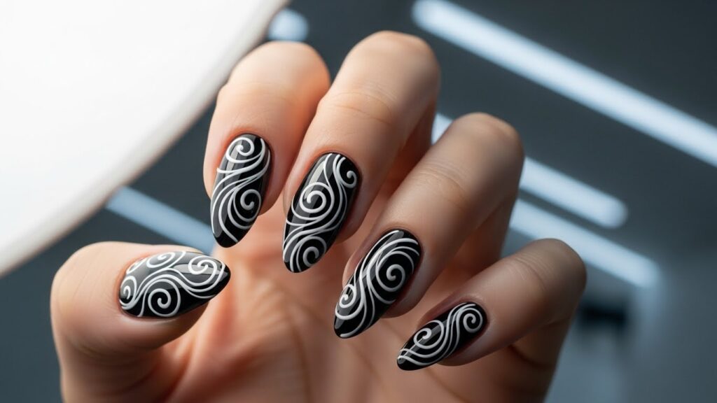 Black nails with white swirl designs