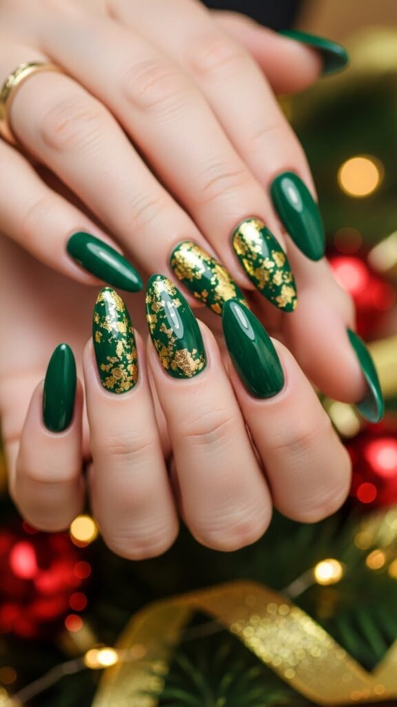Green acrylic Christmas nails with gold foil holiday accents